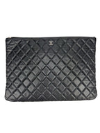 Chanel Black Caviar Large O Case Clutch