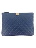 Chanel Blue Caviar Quilted Medium O Case Clutch