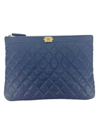 Chanel Blue Caviar Quilted Medium O Case Clutch
